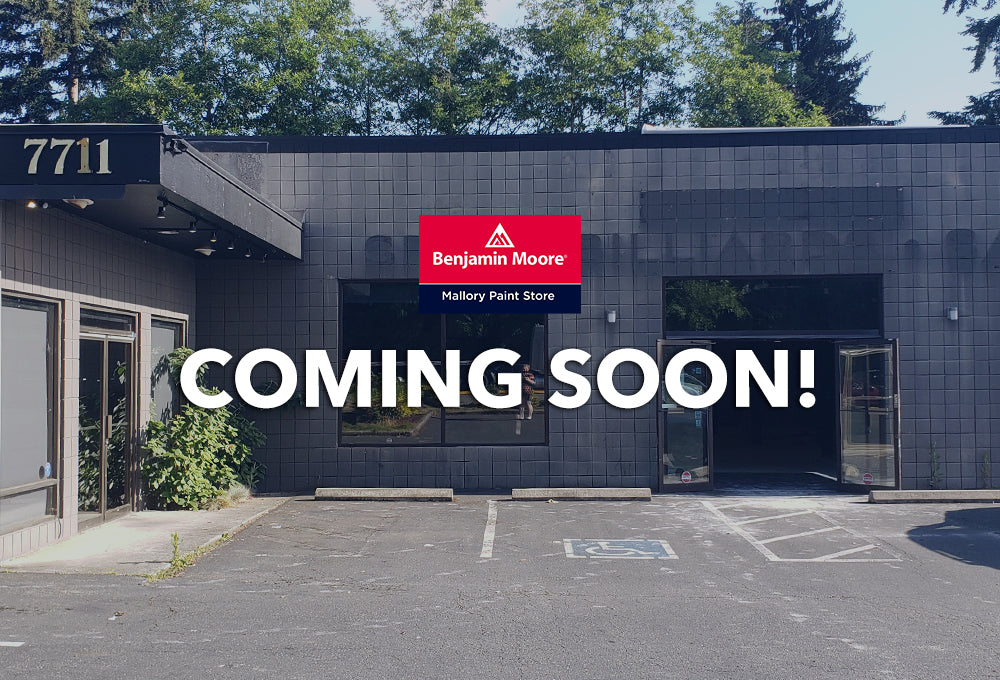 Exterior of building where new Mallory Paint Store Shoreline location is moving to, with the words "Coming Soon!" and the Mallory Paint Store red and blue logo.